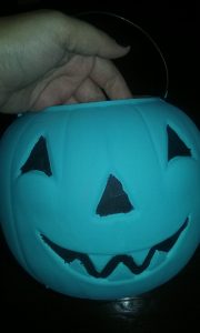 My teal pumpkin is a plastic pumpkin bucket I'll be hanging from a post outside during Trick or Treating